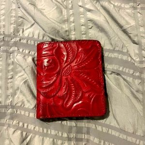Patricia Nash - red wallet w/ a display and card slots, and area for money.